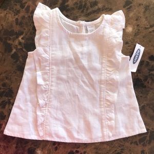 White linen baby girl sleeveless top